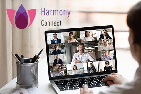 笔记本电脑上的 Harmony Connect 标志和 Zoom 会议