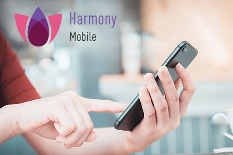 Harmony Mobile logo with hand and mobile phone
